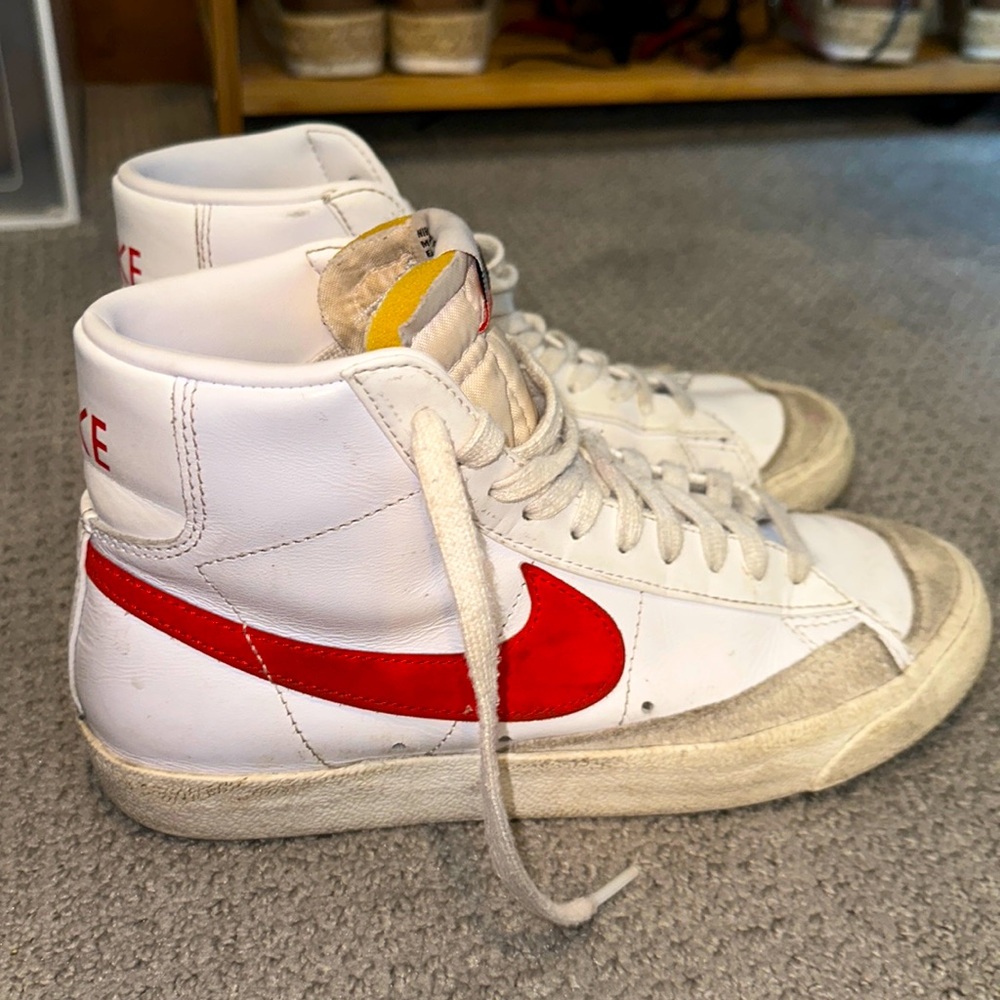 All white Nike blazers